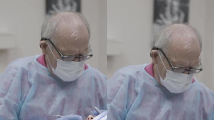 一位经验丰富的牙医为其怀孕患者进行口腔护理的垂直视频