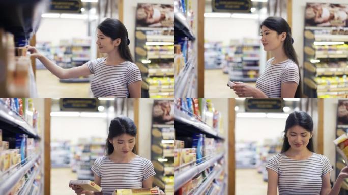 一位亚洲女孩游客从两种产品中选择一种。快乐的商店访客。商店里的产品选择