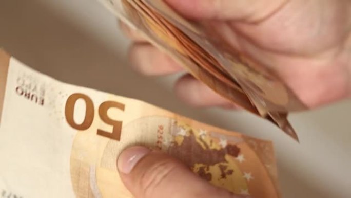 Man Counting Money. Close up of male hands countin