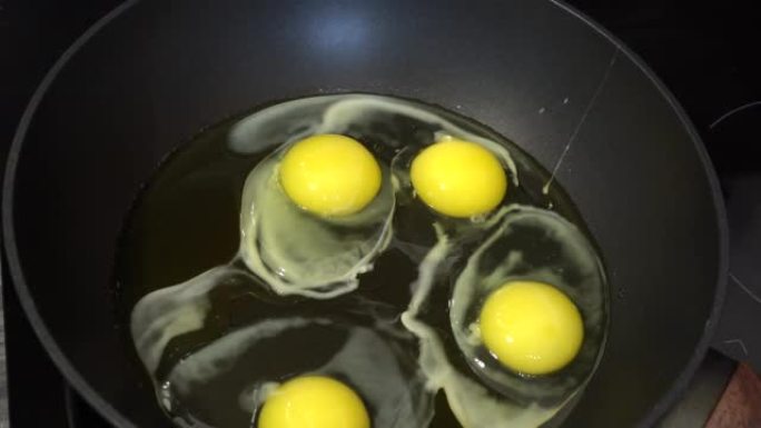 炒鸡蛋烹饪过程的幻灯片拍摄。Macro dolly准备炒鸡蛋。酮饮食元素减肥概念。