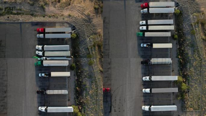 美国德克萨斯州卡车停靠站/加油站停放的几个半决赛的俯视图 -- 无人机视图