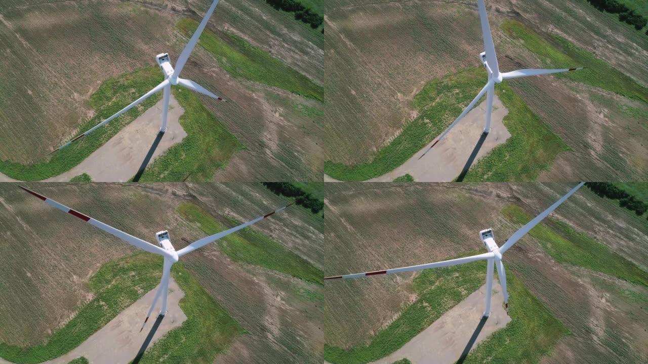 田间风车农场的鸟瞰图。世界能源电力危机。绿色能源生产理念。产生清洁可再生能源的风力涡轮机。高角度拍摄