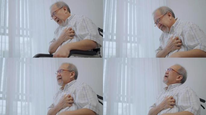 亚洲老人患心脏病。坐在轮椅上的男性患者呼吸困难和胸痛。