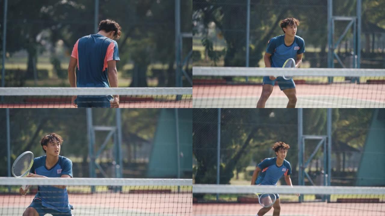 有进取心的中国亚洲男子网球运动员，打算在硬地网球比赛中击球