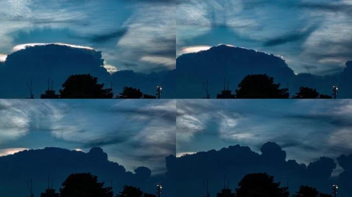 Cloud iridescence on blue sky at evening