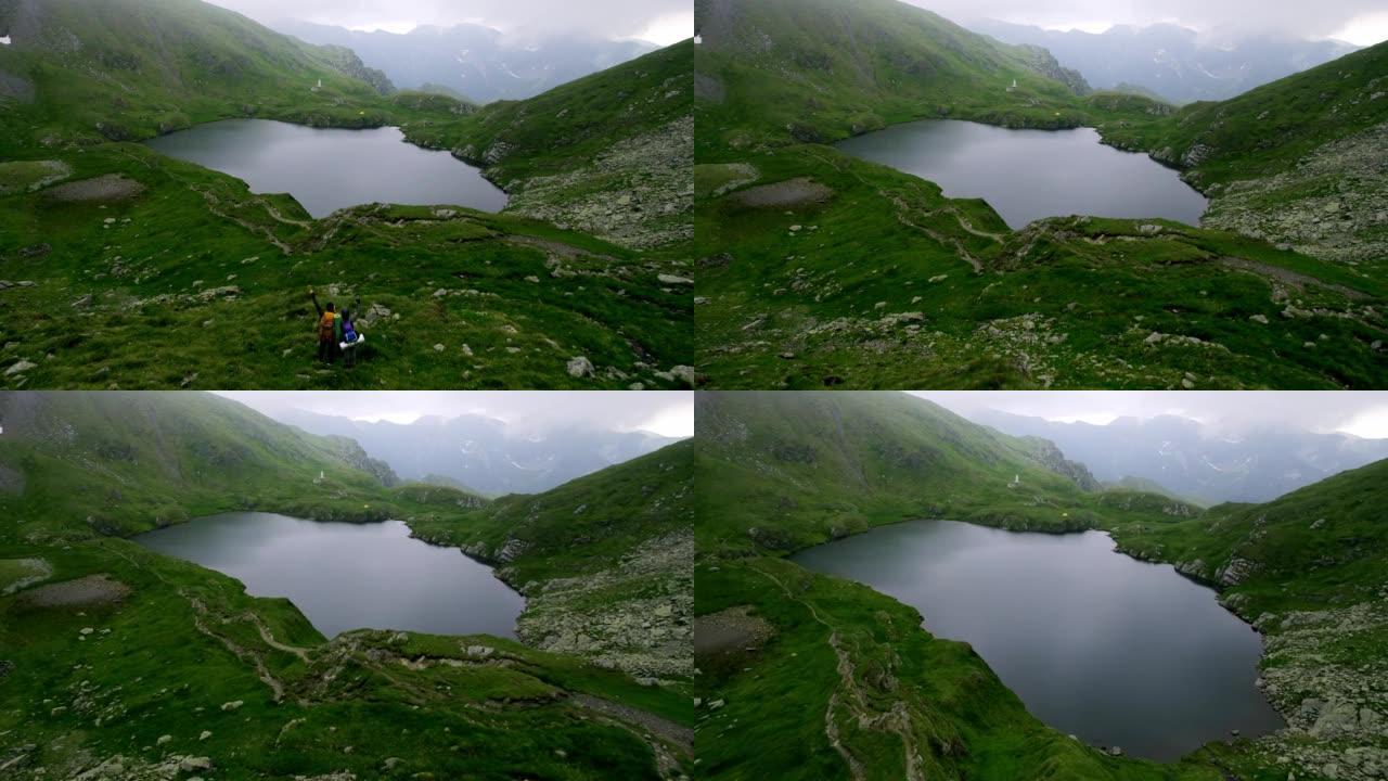 山间一个美丽湖泊的鸟瞰图。电影镜头山湖。