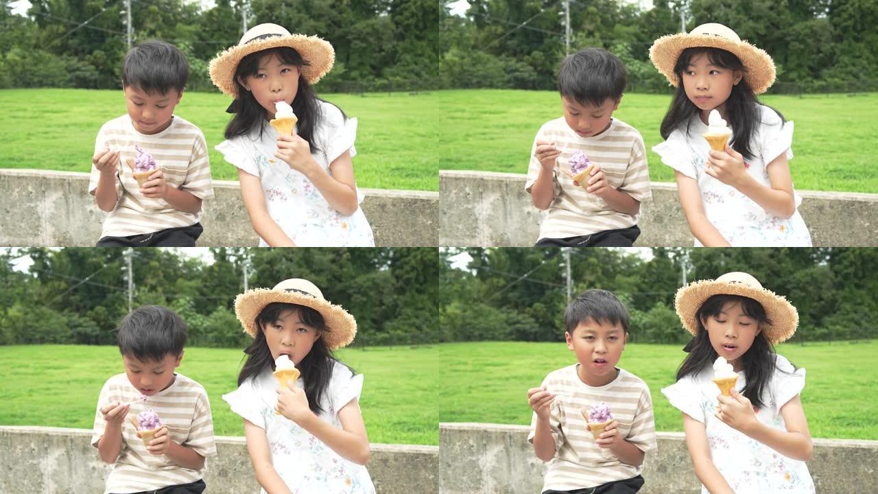 亚洲孩子在旅行休息时吃软冰淇淋