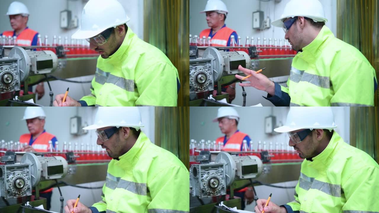 机械厂总工程师检查输送机械的电机，检查堵塞的工作情况