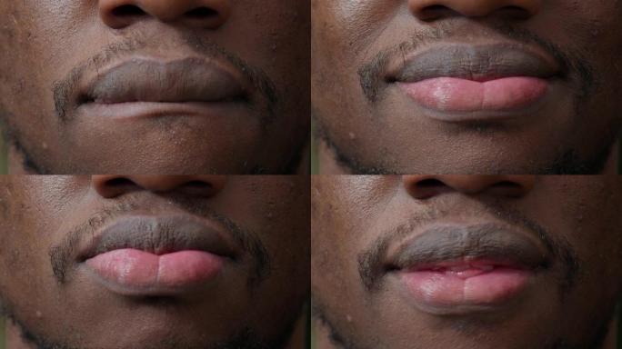 非裔美国人移动嘴唇的宏观镜头