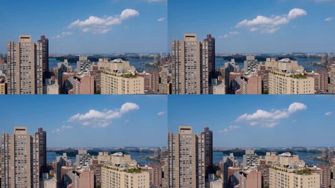 RFK桥和地狱门桥从曼哈顿上东区可以从东河远眺。带有慢速前进摄像机运动的航拍视频。