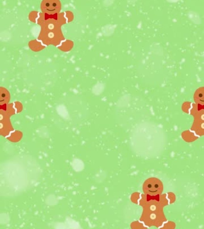 绿色和白雪背景上姜饼饼干图案的循环视频。