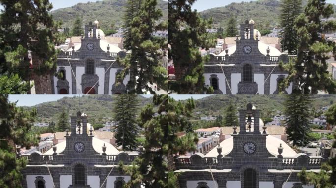 Teror教堂的新皮诺教堂朝着钟面飞行的多莉