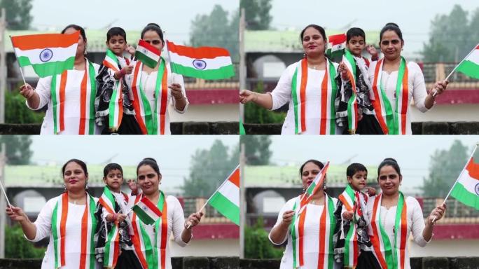 印度家庭在家里一起挥舞印度国旗