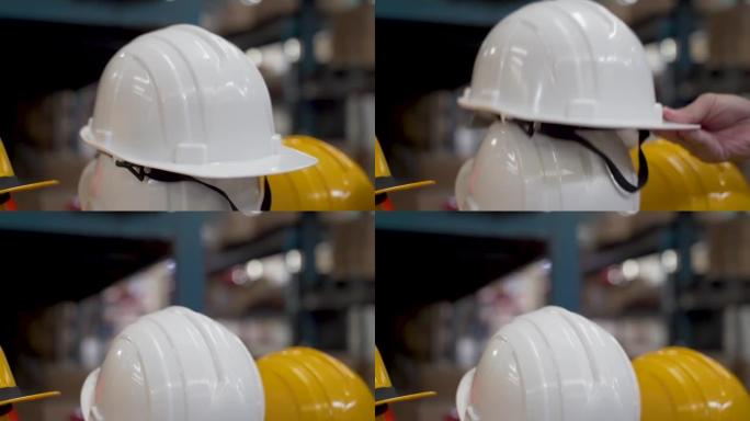 慢动作，特写把头盔放在架子上，用来穿东西，防止危险，有个手工员工想要戴上它，拿起它，然后从架子上拿下