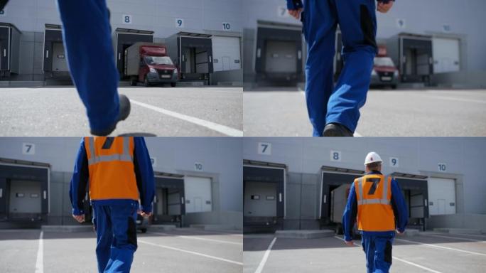 Engineer walks to truck waiting for unloading at t
