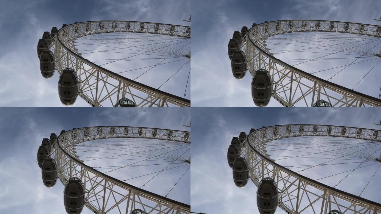 背景为蓝天的伦敦眼摩天轮的低角度拍摄