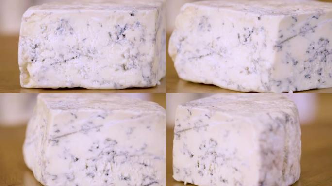 蓝纹奶酪质地特写。一块带有高贵霉菌的奶酪。具有独特味道的蓝纹奶酪