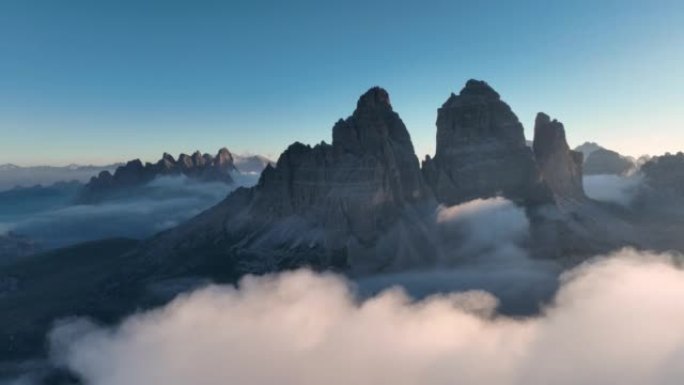 Flying above the clouds, stunning aerial view of t