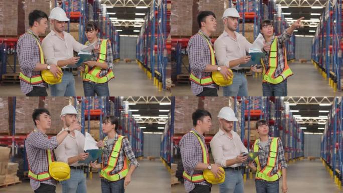 仓库人员小组检查生产存储。在一个巨大的工业仓库中，穿着安全制服和安全帽的多民族工业同事讨论了分配计划