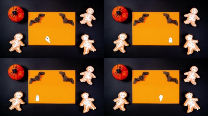 橙色背景上的4k白色幽灵。黑色矩形框架装饰有橙色南瓜，黑色蜘蛛和骨架状姜饼。