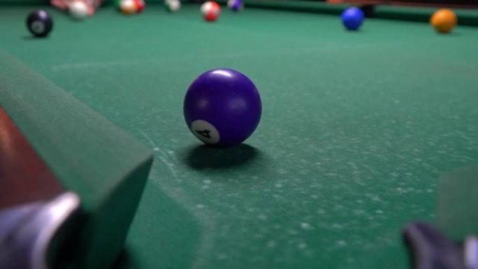 Pool balls being hit on a pool table. Billiard clu