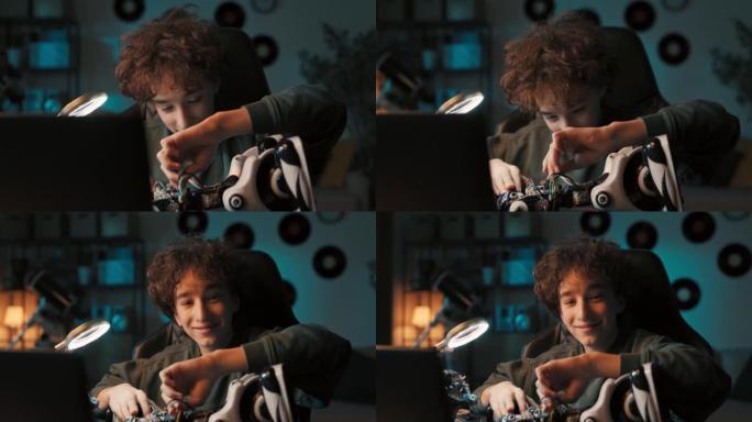 一个男孩的肖像在桌子上的房间里度过时光，修理机器人，拧螺丝以改善玩具的操作，对机械，电子，机器人技术