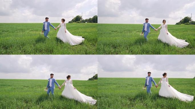 Just married couple walking in nature, hold hands 