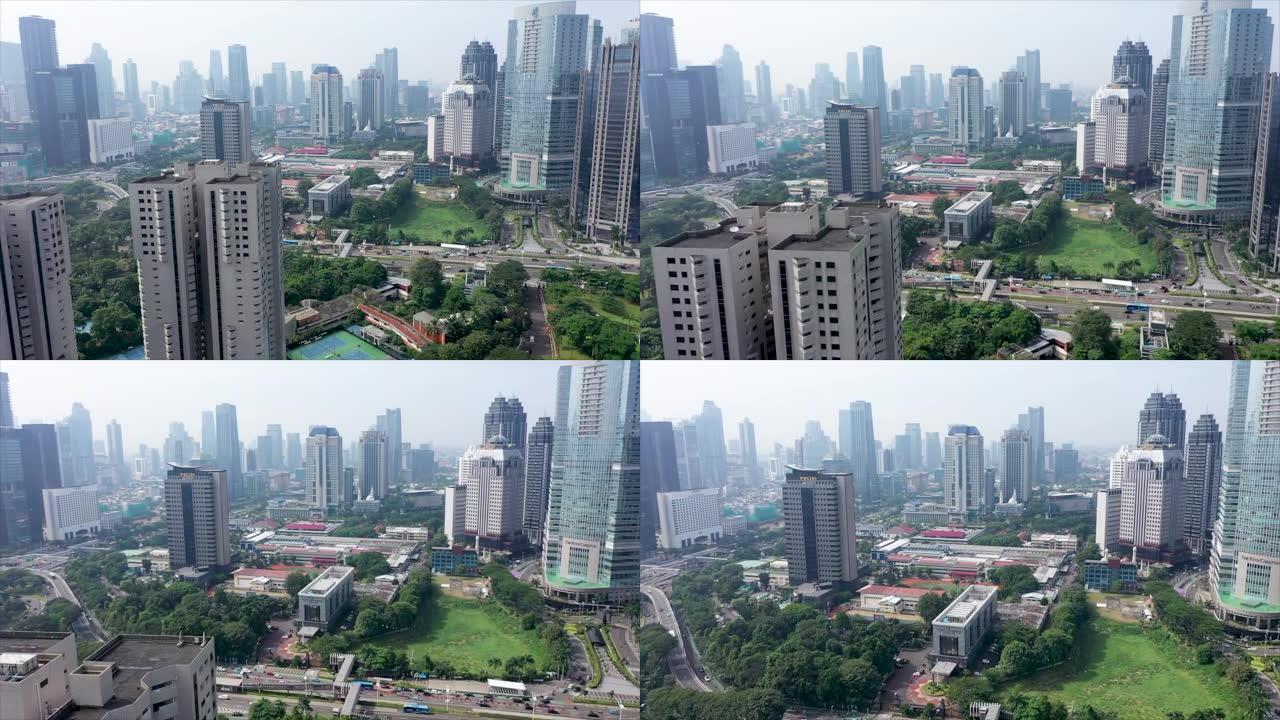 雅加达、印度尼西亚、2022年5月20日。雅加达市雾蒙蒙的早晨，现代办公楼的美丽鸟瞰图。从无人机以4