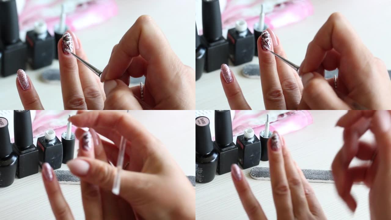 A woman applies nail polish. Does a manicure. Next