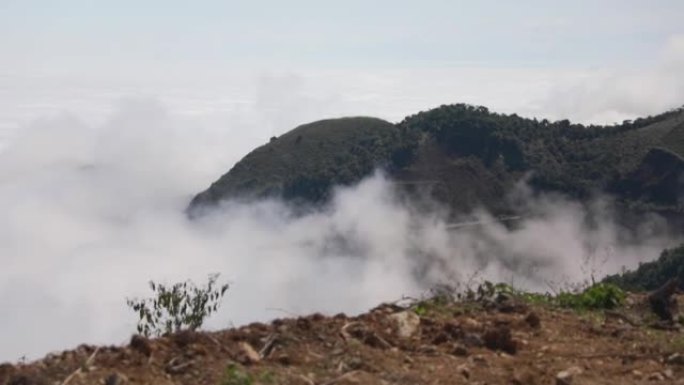 View of clouds from above on a mountain