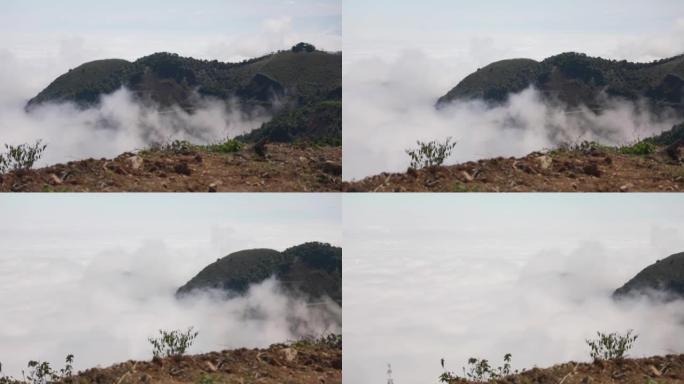 View of clouds from above on a mountain