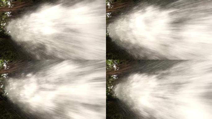从强大的快速流动的瀑布下方的特写平面图。Verical 4k视频