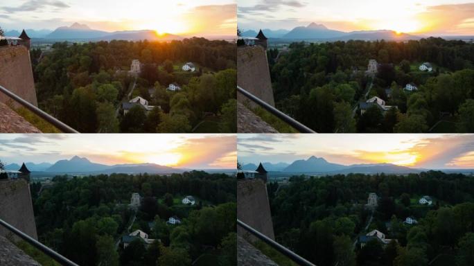 奥地利萨尔茨堡Festungsberg山阿尔卑斯山的日落延时空中全景