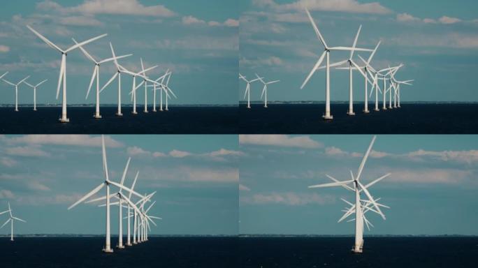 一排风力涡轮机在海上