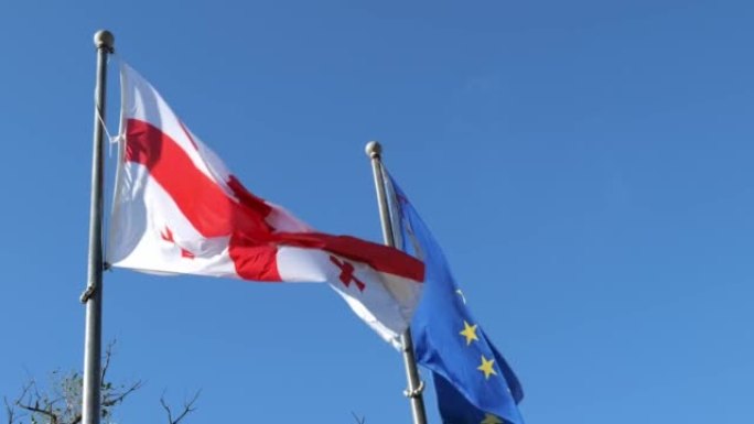 格鲁吉亚国旗和欧盟国旗。格鲁吉亚和欧洲联盟的国旗