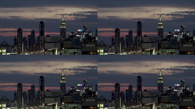 日落之后的纽约天际线与戏剧性的天空