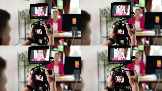 女商人博客在摄像机上录制视频拍摄视频