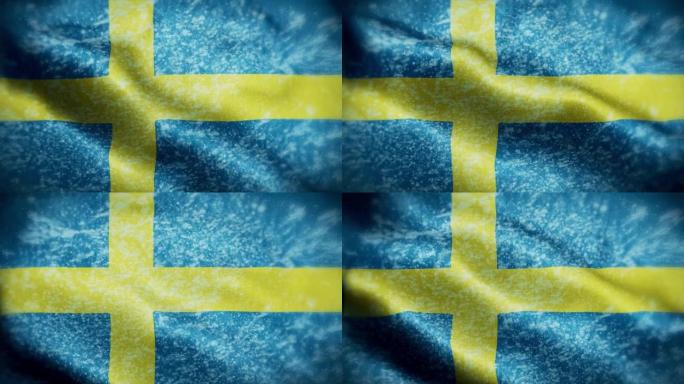 4K暴风雪/雪在瑞典国旗股票视频。冷淡的瑞典国旗。旋转/旋转的冰晶。雪花掠过瑞典国旗。