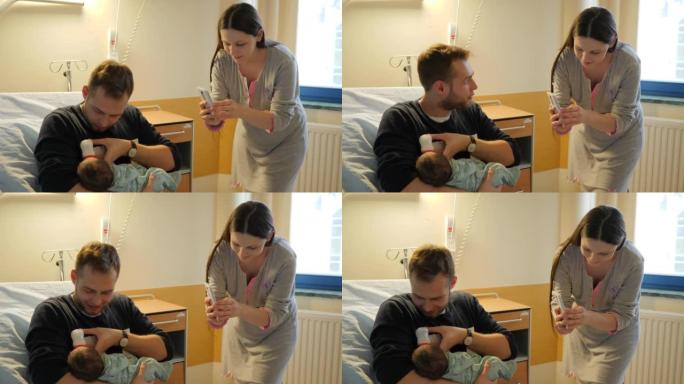 年轻的妻子母亲用手机拍下了年轻的父亲第一次用奶瓶喂他刚出生的女婴的照片，在她出生几天后去妇产医院看望
