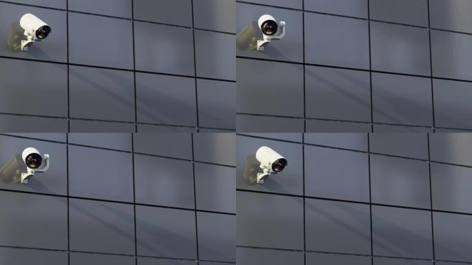 闭路电视摄像机安装在大楼的墙上。扫描该区域以进行监视。可以在安全工作中使用背景。