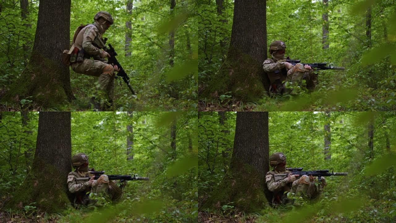 狙击手穿过森林，躲在树后，重新装弹