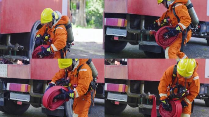 消防员或消防员在工作前将消防管或管线的连接部分连接到消防车的头部连杆上，以扑灭某些区域的火灾