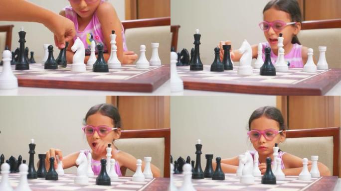 穿粉色框眼镜的女孩下棋