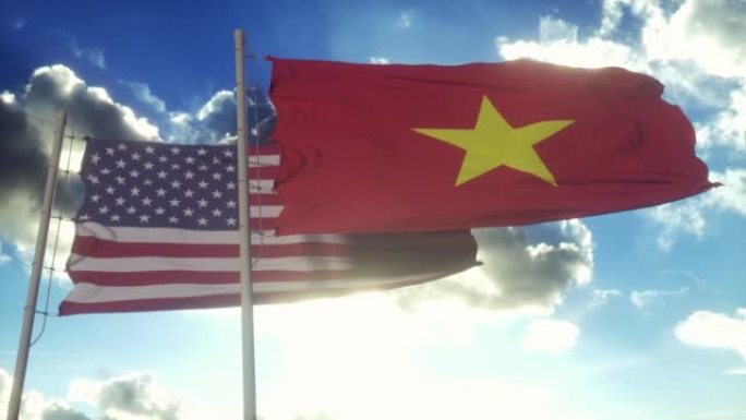 旗杆上挂着越南和美国国旗。越南和美国在风中挥舞着国旗。越南与美国的外交概念