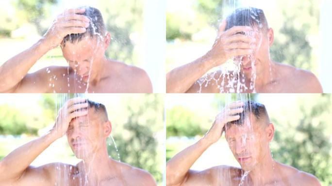 有魅力的帅哥是热的，在炎热的夏天洗澡