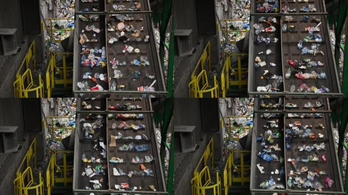 垃圾分类设施输送机将垃圾运走。垃圾回收主题