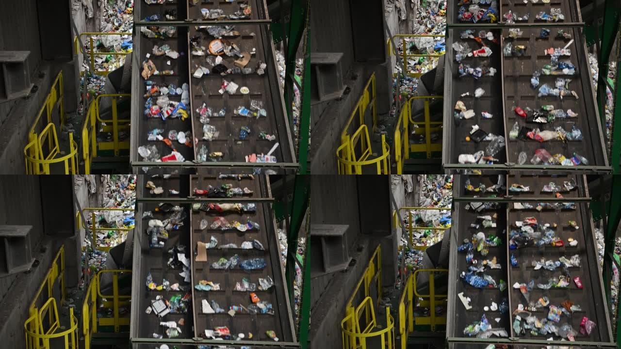 垃圾分类设施输送机将垃圾运走。垃圾回收主题