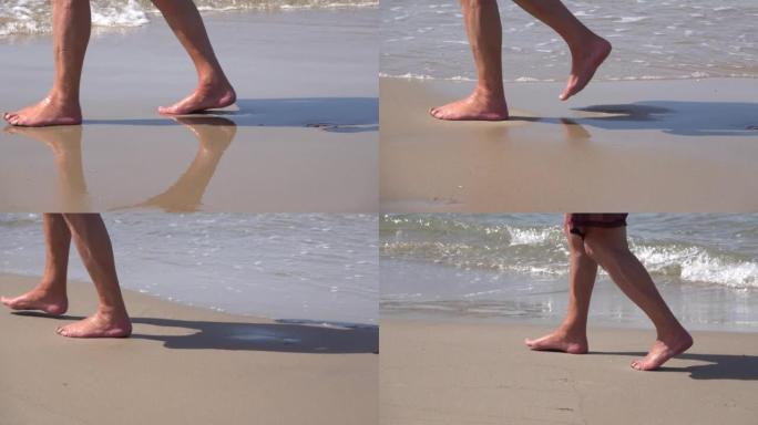 一个老人的赤脚在沙滩和海浪上行走。