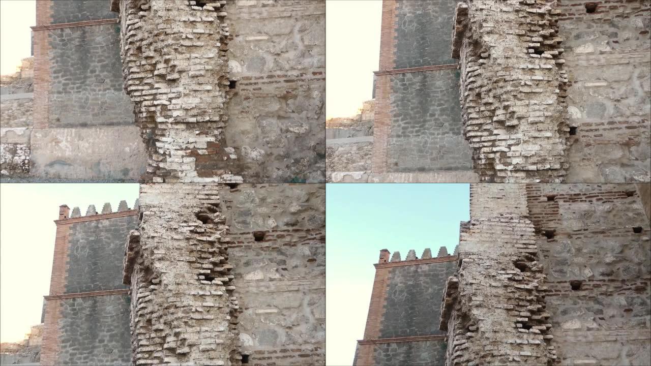 阿拉伯城堡墙上的风化砖柱