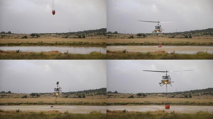 消防直升机在河中取水